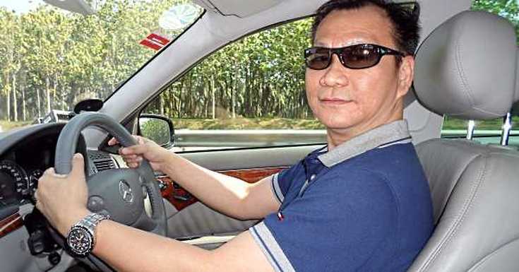Kelvin Wong in his Mercedes-Benz